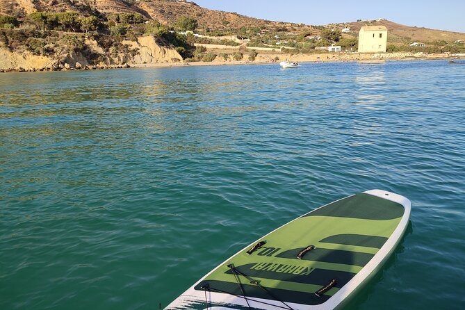 4 Hours Catamaran Tour to the Scala dei Turchi - On board with Giuseppe: snacks, SUP, and the calm that makes it work