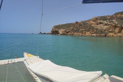 4 Hours Catamaran Tour to the Scala dei Turchi - Le Pergole beach: clear water, easy swim time, and Monterosso Tower views