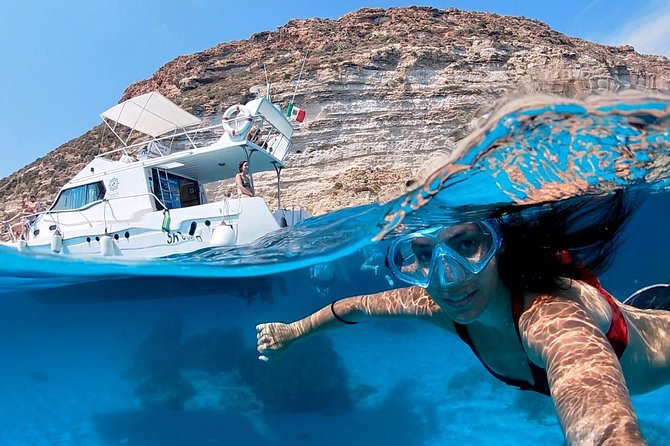7 hours Boat trip to Lampedusa lunch, SUP and Snorkeling - Key highlights (the stuff you’ll actually remember)