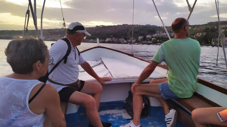Aci Trezza boat tour sunset and dinner sicilian family home - Faraglioni di Ciclopi: from Polyphemus to volcanic time
