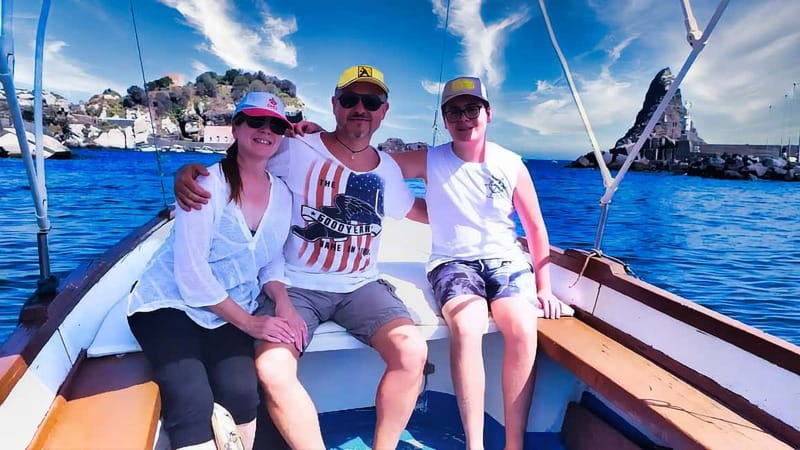 Aci Trezza: Cyclops Coast Boat Tour with Food and Swimming - Faraglioni and the Cyclops legend: Polyphemus, wind, and ancient rock