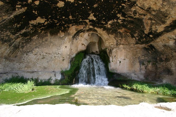 Ancient Syracuse: private guided tour of the Neapolis archaeological park - Anfiteatro Romano di Siracusa: gladiators, crowd space, and Roman reuse