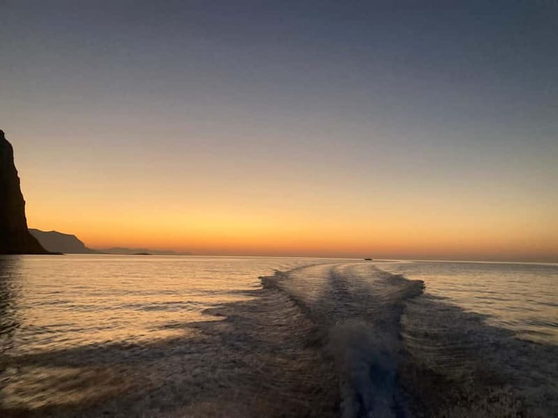 Aperitif on a boat at sunset at the Queen Cave - Navigating past Grotta della Regina and Villa Igeia from the water