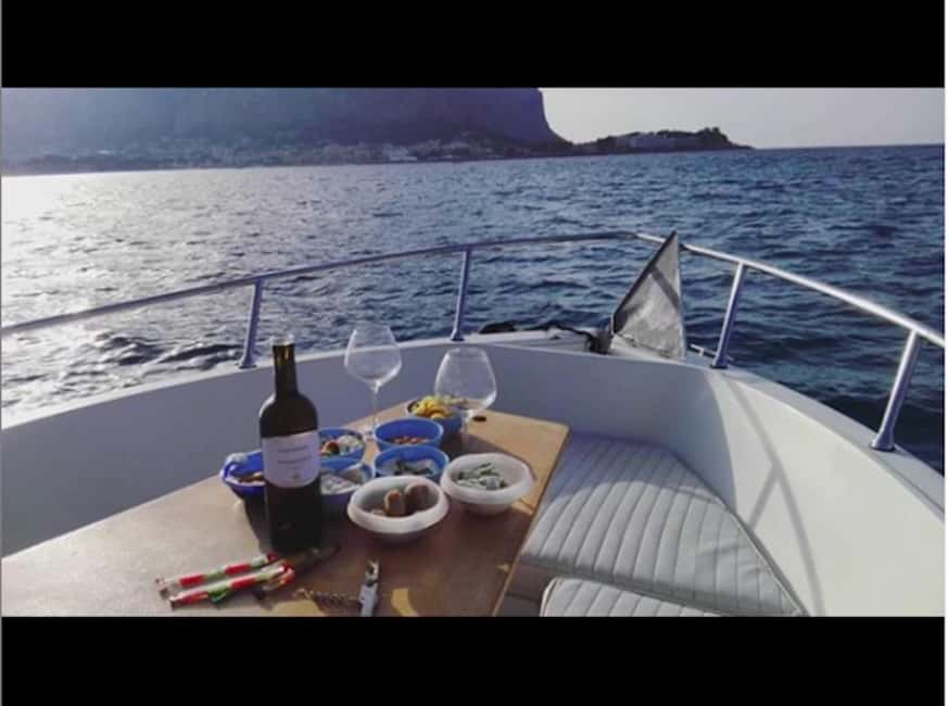 Aperitif on a boat at sunset at the Queen Cave - Should you book this Palermo sunset boat tour with aperitif?