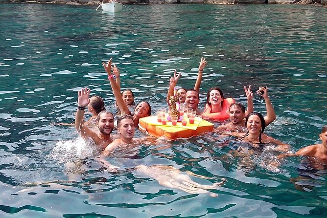 Boat excursion Taormina Giardini Naxos - The Bay of Sirens Swim Stop: Sea-Green Water and a Quick Plunge