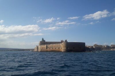 Boat Excursion to Ortigia with Typical Homemade Lunch - Sea caves on the north side of Syracuse: coral flowers and that color inside