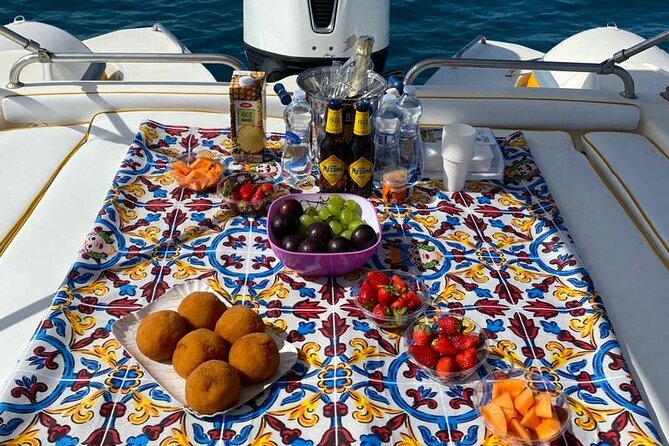 Boat tour from Avola to Portopalo with a stop in Marzamemi - Aperitif on board: the food and drink you actually remember