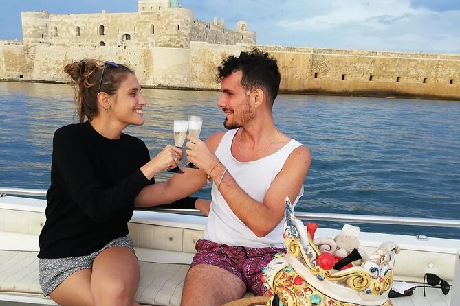 Boat tour of Ortigia, sea caves, Pillirina and snorkeling - What you’re really paying for on a 2-hour Syracuse boat ride