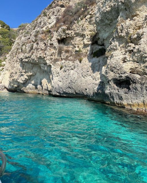 BOAT TOUR WITH APERITIF ON BOARD IN THE CYCLOPS ISLANDS - Your 2-hour route: Lachea, Faraglioni, Ulysses spots, and Aci Castello viewpoints