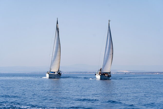 Catania boat tour along the coast with aperitif and snorkeling - Aci Trezza: Swimming Time That Actually Feels Like a Break