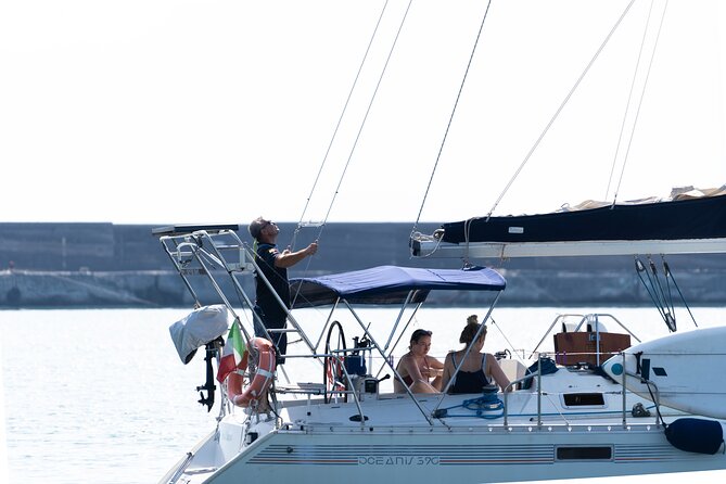 Catania boat tour along the coast with aperitif and snorkeling - The Boat Ride Reality: Wind, Shade, and What to Do If You Get Nauseous