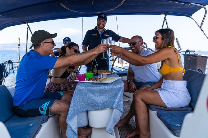 Catania boat tour along the coast with aperitif and snorkeling - Aci Castello: The First Coastal Hit of Architecture Meets Sea