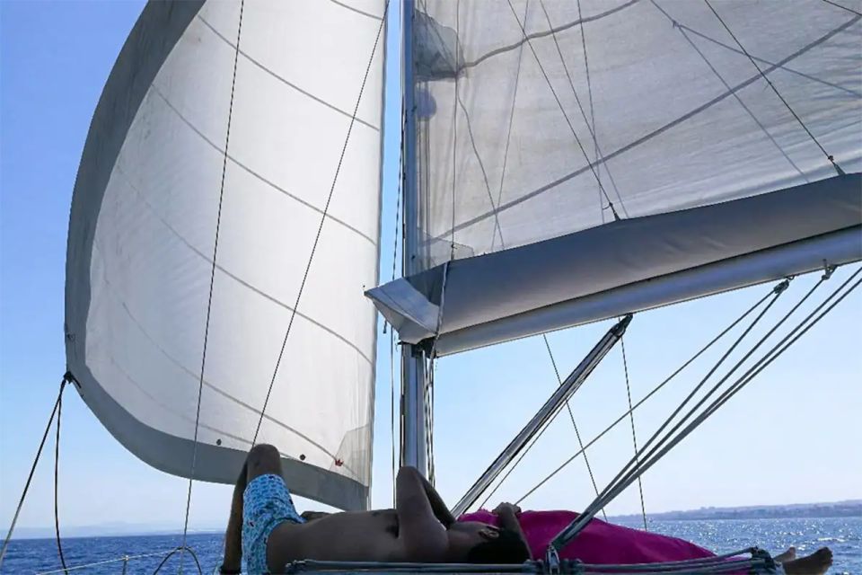 Catania: Coastline Sailing Trip 6hr with Aperitif and Lunch - Swim Stops Near the Caves of Ulysses