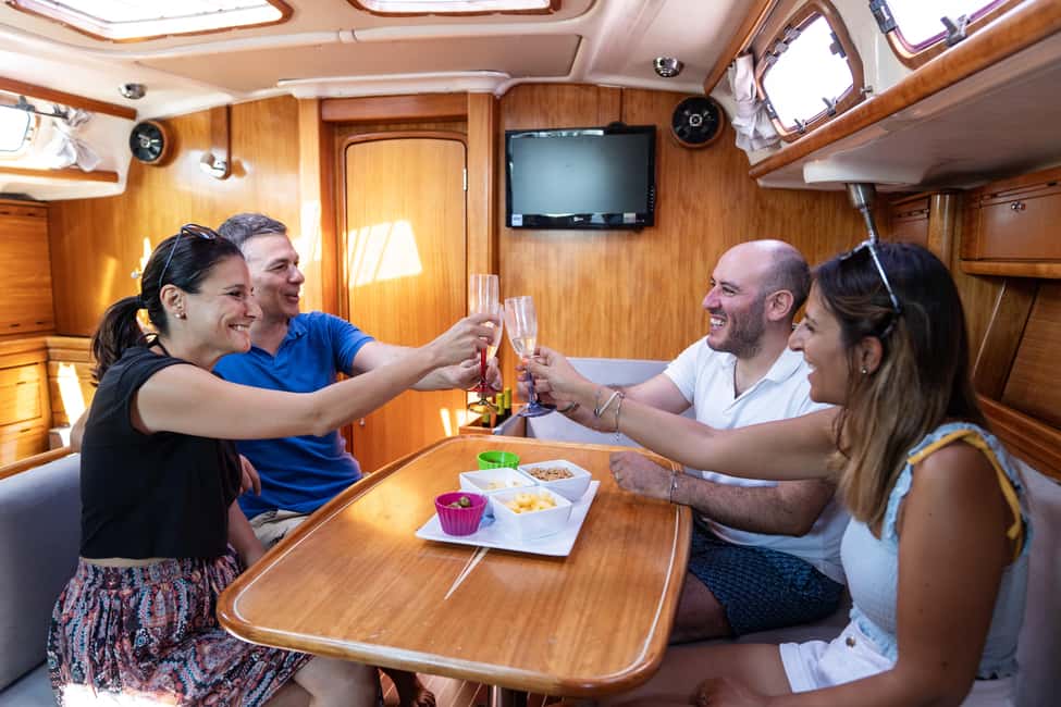 Catania: Cyclops Coast Cruise with Appetizer & Snorkeling - Aci Trezza and the faraglioni: snacks with serious scenery