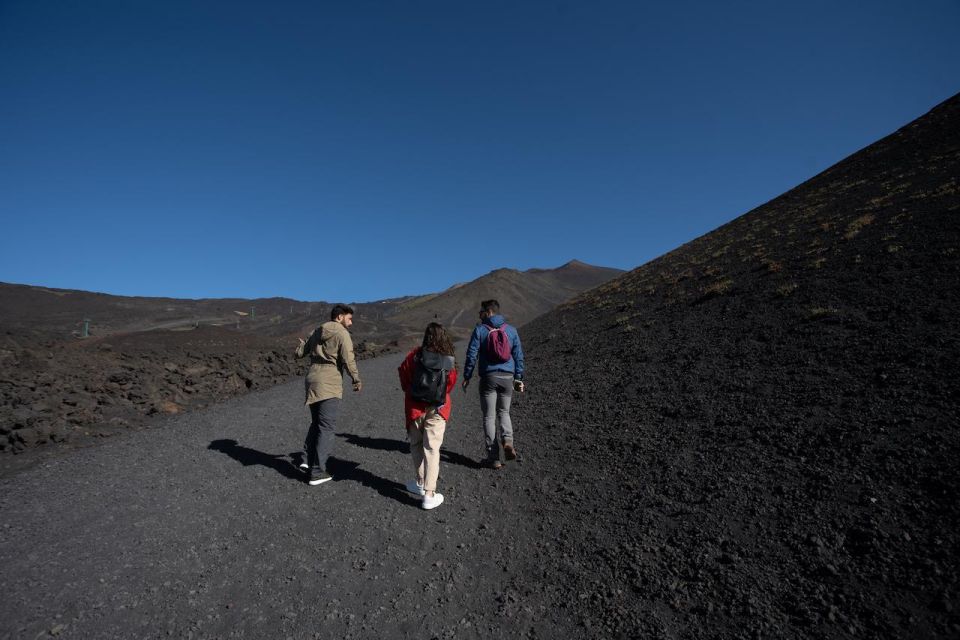 Catania: Etna Morning Excursion with Tasting and Pickup - A lava cave you actually enter: helmet, flashlight, and real scale