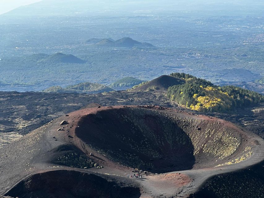 Catania: Etna Morning or Sunset Trek with Lava Tunnel & Gear - Entering the lava tube: helmet on, flashlight ready, and why it’s cool inside
