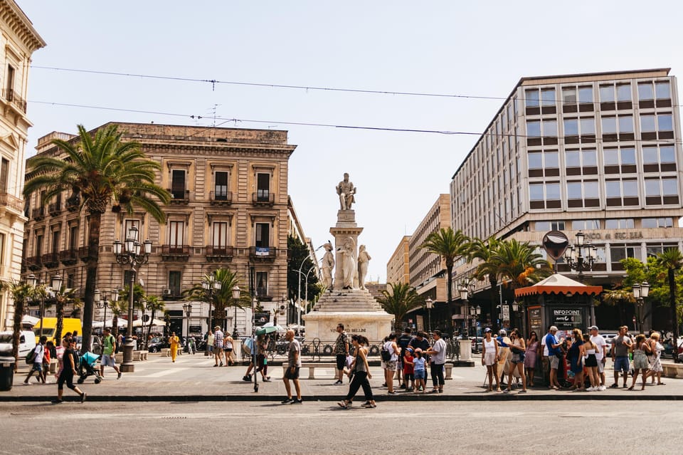 Catania: Guided Street Food Walking Tour - Piazza Duomo and Piazza Università: photos plus a palate reset
