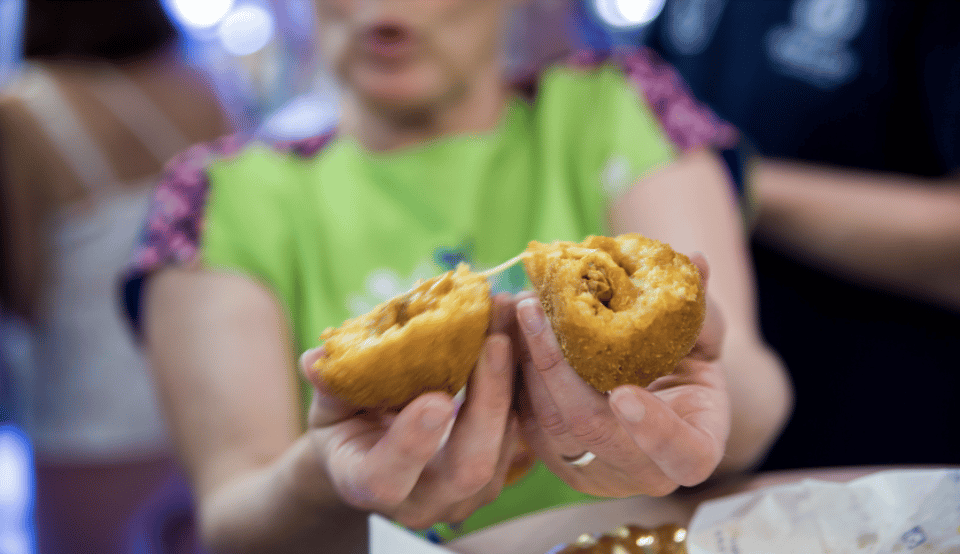 Catania Street food tour by night - La Pescheria market: fried seafood cone or grilled horse-meat meatball