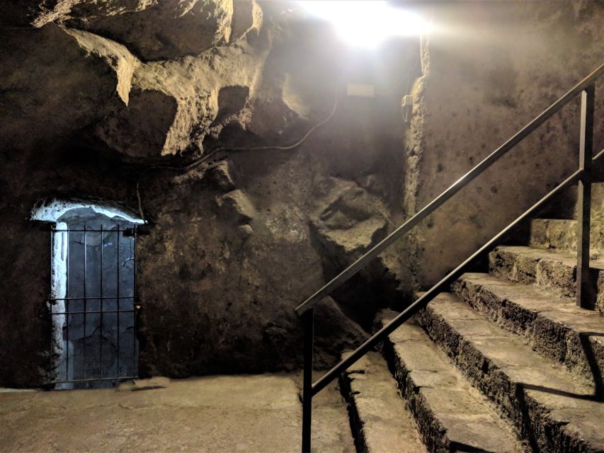 Catania: Underground and Street Food Walking Tour - The Amenano Underground River Leads to the Thermal Baths