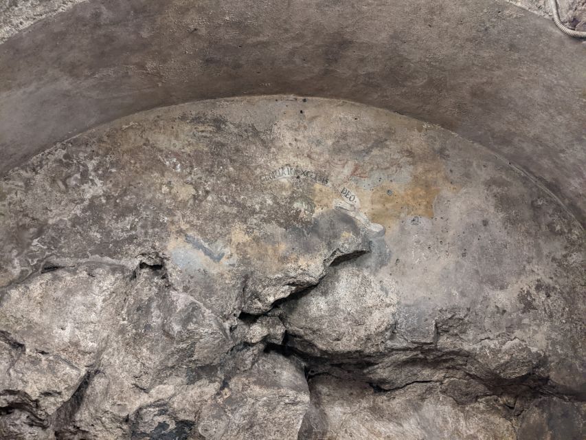 Catania: Underground Catania Tickets and Guided Tour - Roman layers: baths, monuments, and the amphitheater connection