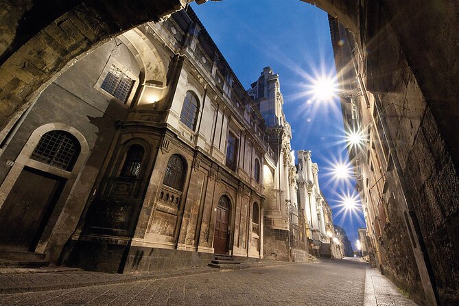 Catania Walking Tour with Audio and Written Guide by a Local - Piazza Università and its four bronze legends