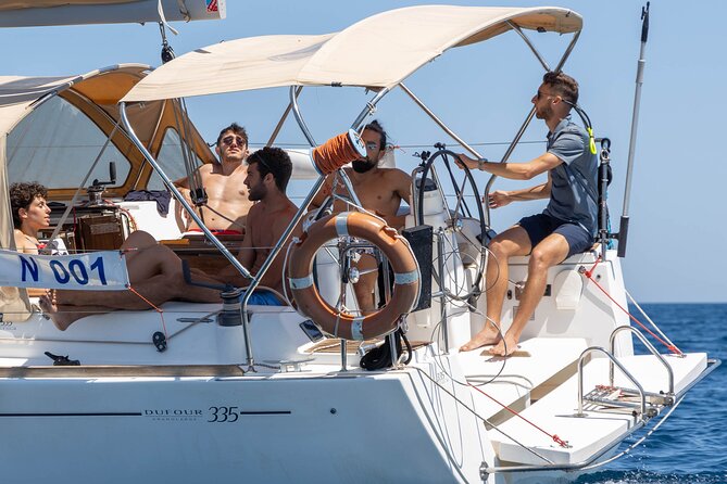 Egadi Sail Boat Tour to Favignana and Levanzo from Trapani - Cala Fredda and Cala Minnola: two swim sessions that feel like separate worlds