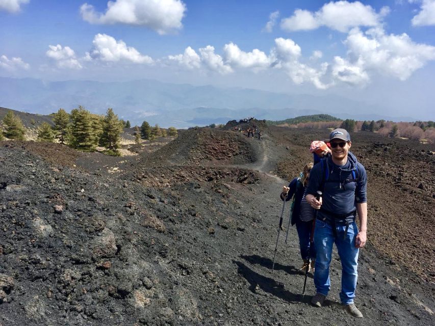 Etna: Craters of the 2002 Eruption Trekking Experience - Summit crater edges and the sandy channel return