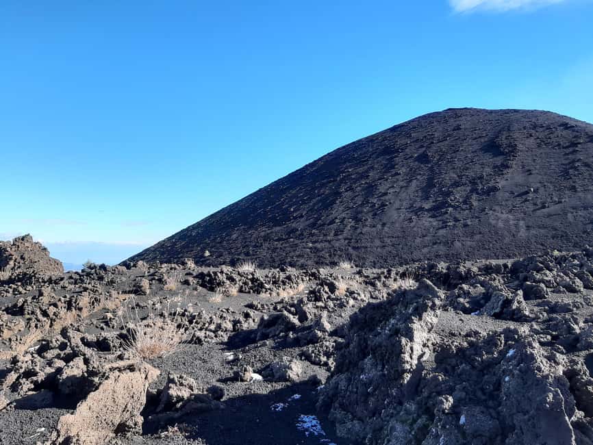Etna: Jeep excursion and trekking suitable for everyone. Shoes and jacket provided free of charge. - Grotta delle Nevi: a cave visit with helmets and lamps