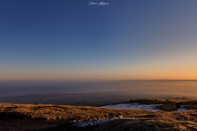Etna Sunset Experience with aperitif - The volcanic cave walk: helmets, torches, and the dark turn