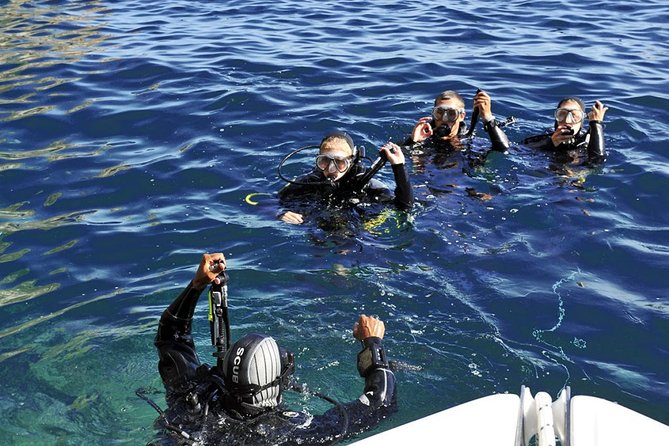 Exciting PADI Discover Scuba Diving Experience Isola Bella Marine Park Taormina - On-board return: Sicilian wine, almond biscuits, and music