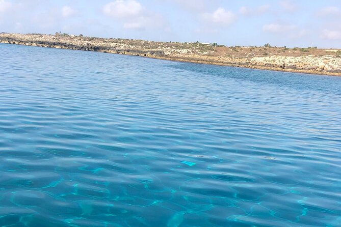 Excursion- FULL DAY - By boat Marzamemi - Vendicari Reserve: grilled fish on board, Pachino bruschetta, and Roman-column water