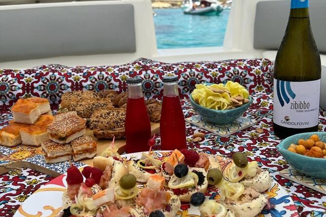 Favignana inflatable boat tour, wine tasting, snorkeling and relaxation - Favignana town for about 1 hour: granita, streets, and what you can fit in