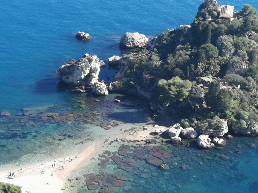 From Catania: Etna & Taormina Day Trip - Exploring a lava-flow cave with helmets and head lamps