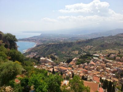 From Catania: Etna & Taormina Day Trip - Mount Etna National Park: dormant craters, biology, and the Valle del Bove payoff