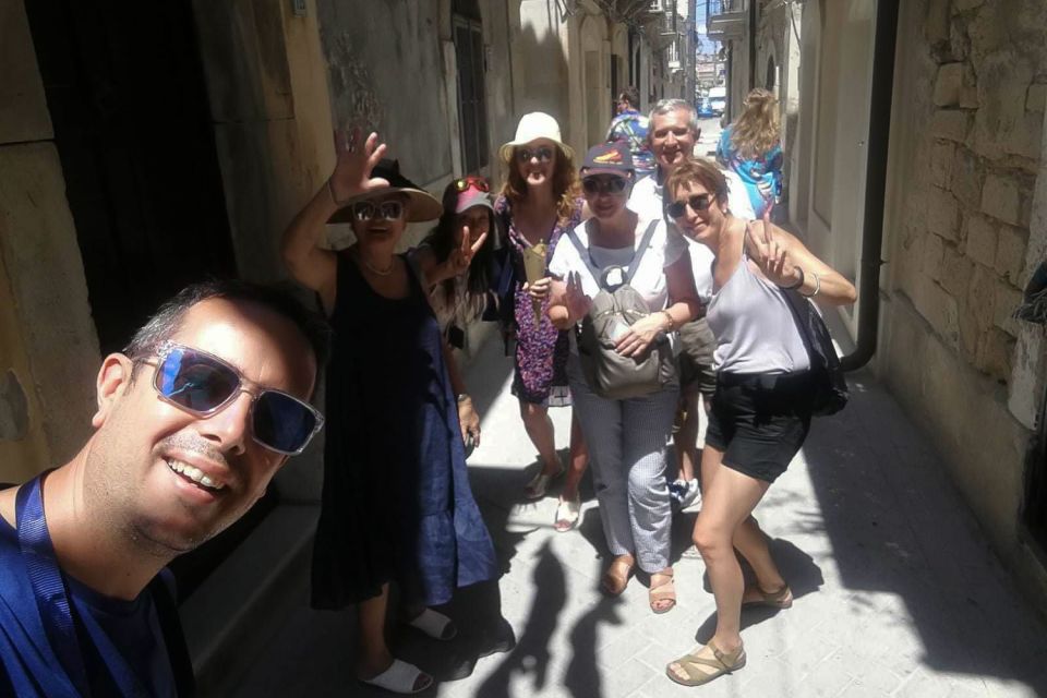 From Catania: Neapolis of Syracuse, Ortygia, and Noto Tour - Neapolis Archaeological Park: Greek Theatre, Latomie caves, and Roman ruins