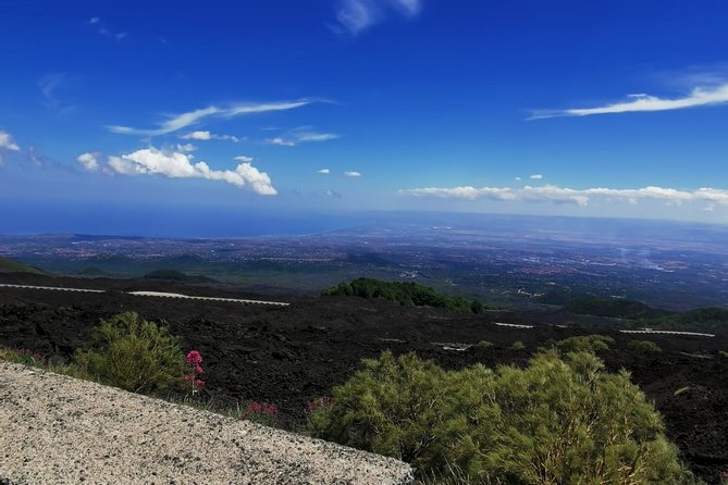 From Catania: Private mt. Etna trekking and pic-nic - Grotta di Serracozzo: helmets, torches, and a guided lava-cave walk