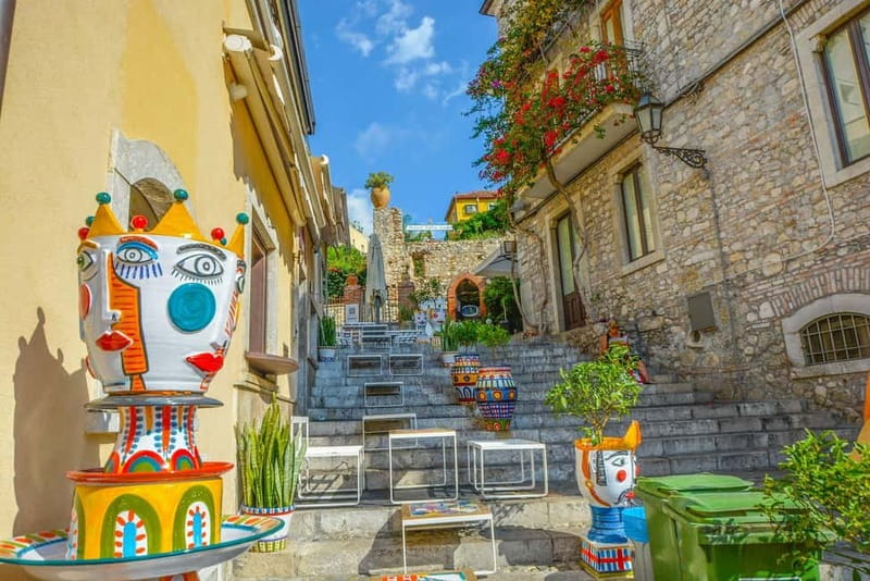 From Catania: Taormina, Isola bella & Castelmola tour - Price and value at about $84 per person