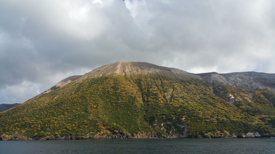 From Taormina: Lipari and Vulcano Mini Cruise Aeolian Tour - Milazzo harbor and the motorboat: scenic water, shared space, real rules