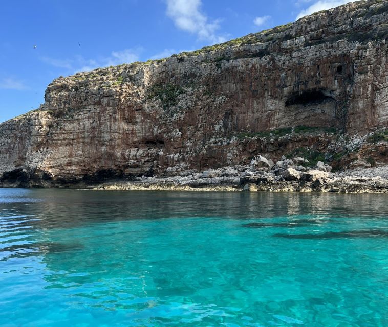 From Trapani: Favignana and Levanzo Full Day Cruise - Cala Minnola and the wine toast moment