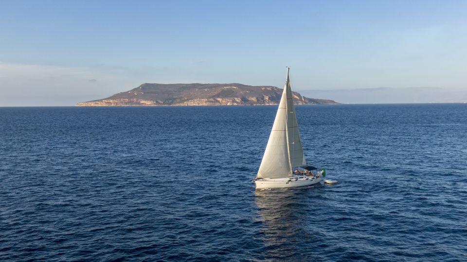 From Trapani: Full-Day Sailboat Trip to Favignana & Levanzo - Favignana port break: white houses, street food, and shopping time