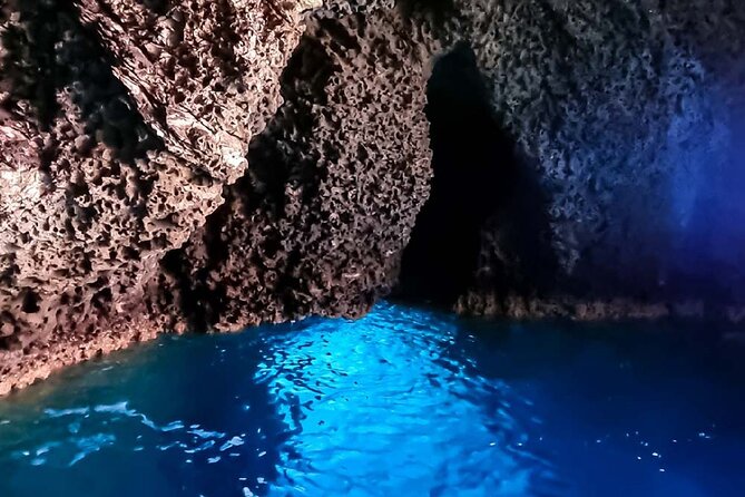 Full Day on board with lunch in luxury private tour - Taormina by sea: caves, rocks, and the planned swim-and-snorkel rhythm