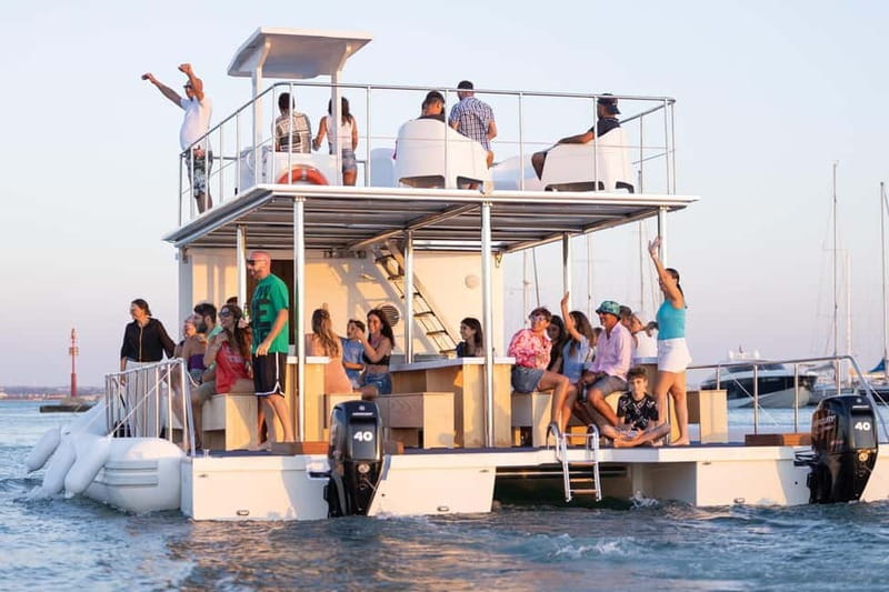 Giardini Naxos: Dolphin Catamaran Sunset Tour with Aperetif - Taormina Coast Highlights by Boat: Grotta dell’Amore to Capo Taormina