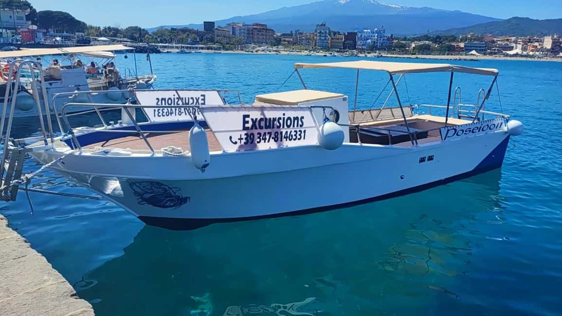 Giardini Naxos: Sunset Dolphin Watching Cruise with Aperitif - The bay tour route: caves, iconic points, and show spots