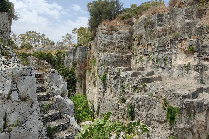 Group guided tour of the archaeological park of Neapolis - Stop 2: The Ear of Dionysius cave visit