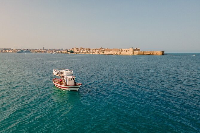 Half Day Boat Tour on the Syracuse Coast with Lunch - Ortigia by sea: prison walls, forts, and the waterfront promenade