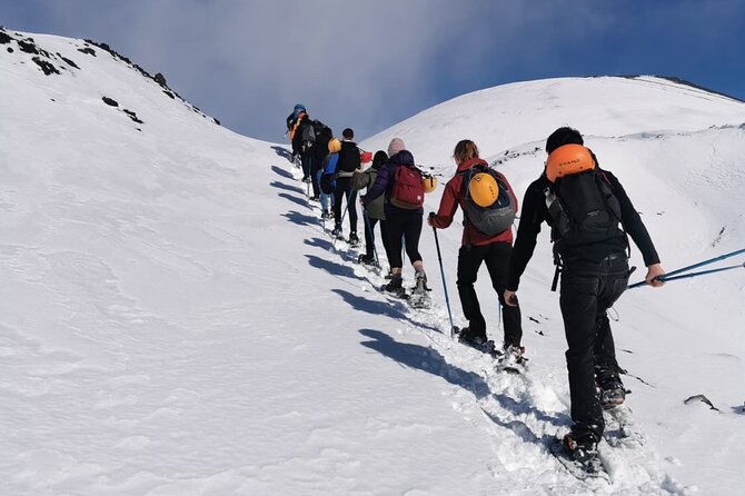 Hike near the summit craters up to the maximum safe altitude currently foreseen - Descent and getting back down without losing the magic
