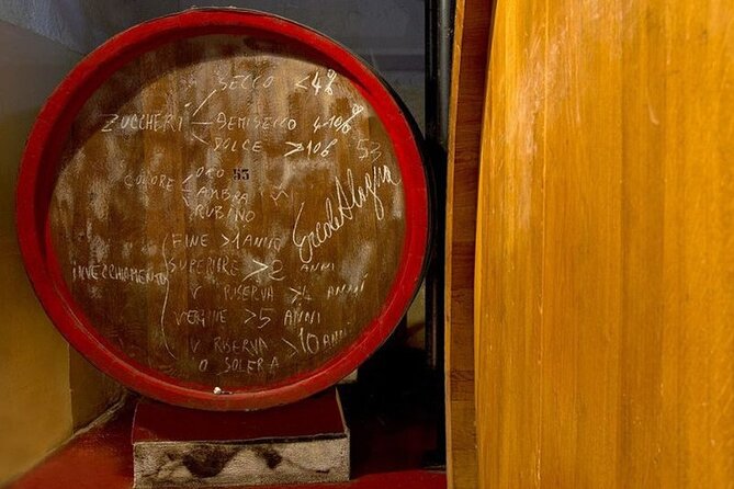 Historic winery visit with food and wine tasting in Marsala - The tasting room flow: 12 wines, plus Sicilian food
