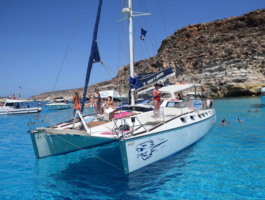 Lampedusa: Dolphin watching with aperitif at sunset - Sunset sailing on the El Condor catamaran