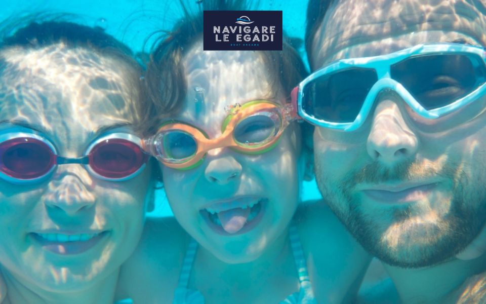 Marsala: Favignana dinghy tour with wine tasting - Favignana coves and snorkeling: where the day really happens