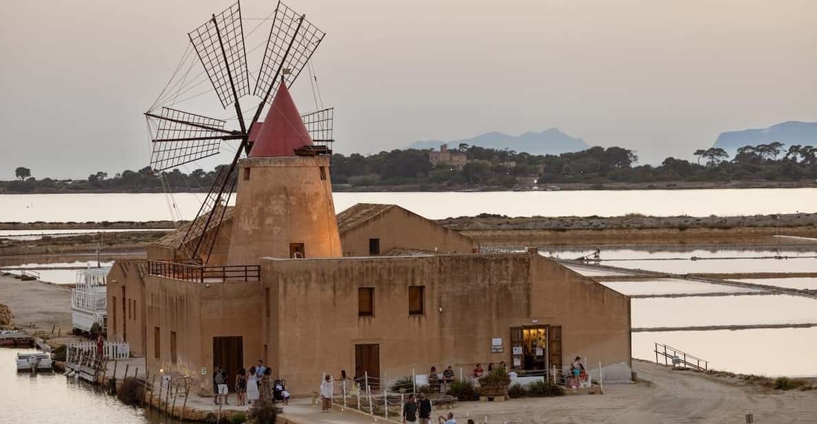 Marsala: Guided Salt Pans Walk Tour with Windmill Visit - Walking the salt flats: mosaic colors and how pans are managed